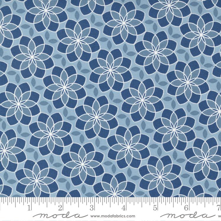 Blue designer fabric by the yard with walnut patterns